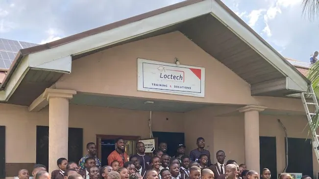 A group participating in technology training at Loctech