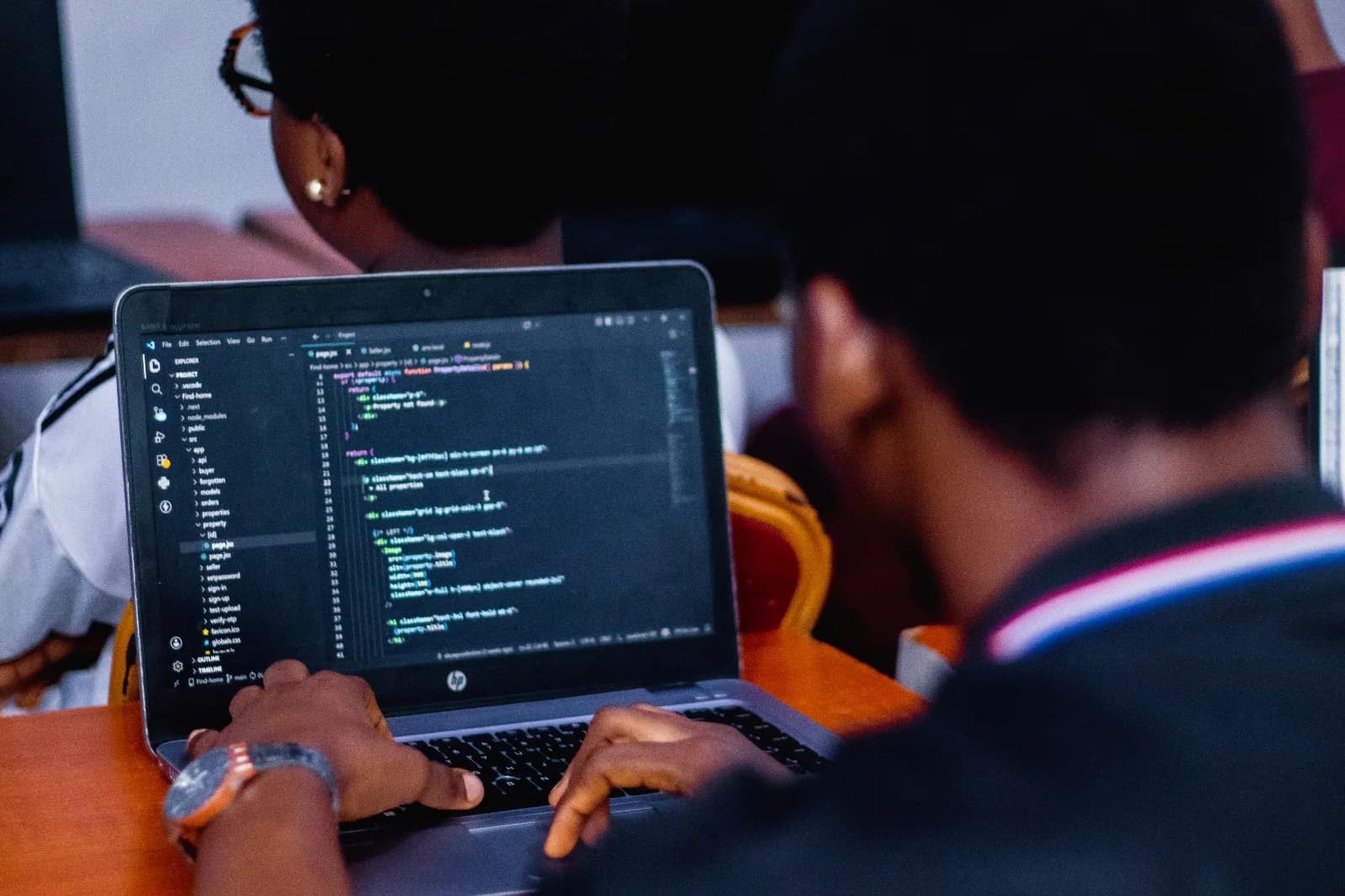 Loctech learners practising coding in class